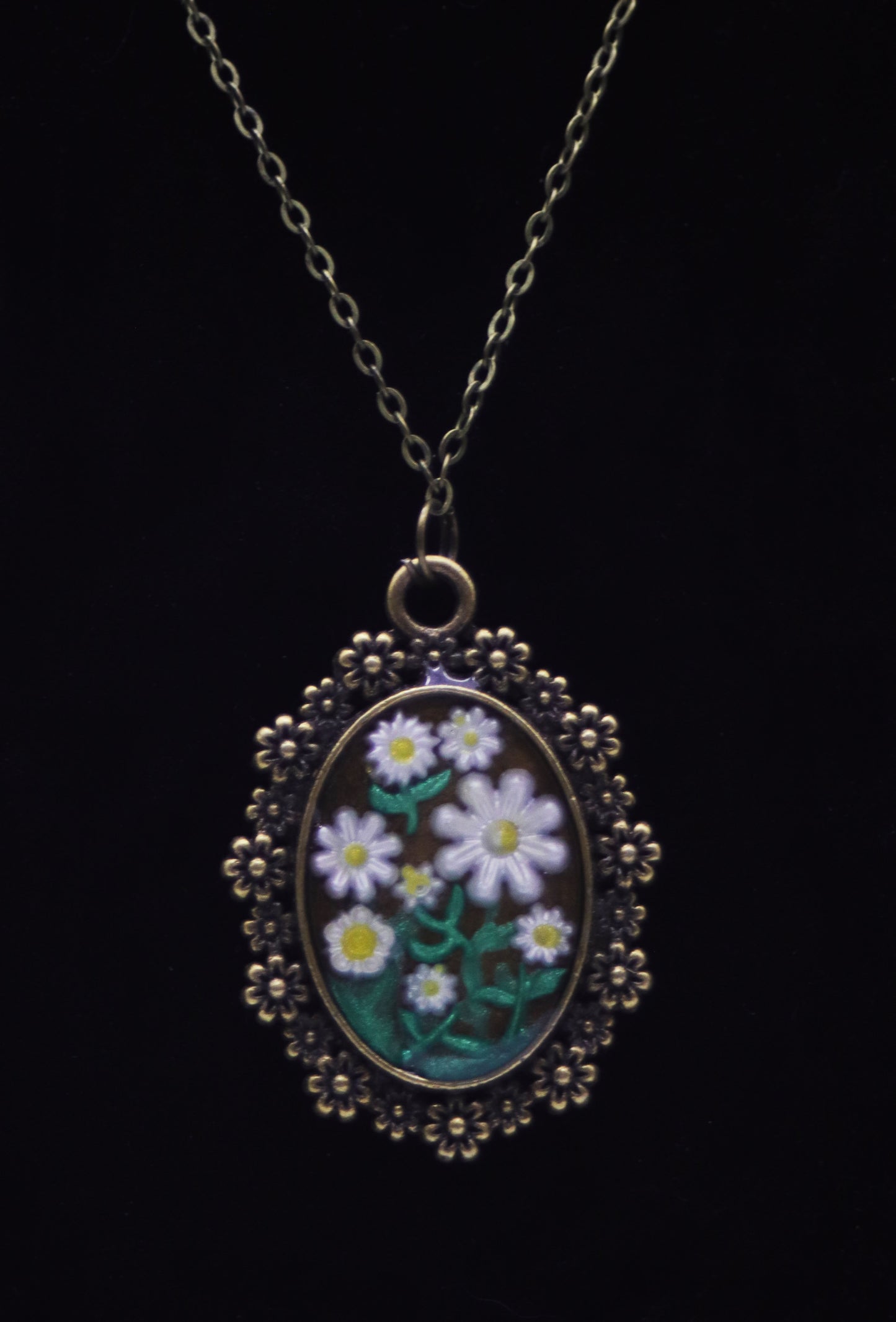 Antique bronze oval resin necklace with daisy border and handcrafted white daisy flowers